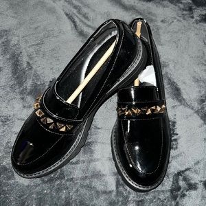 Black studded loafers